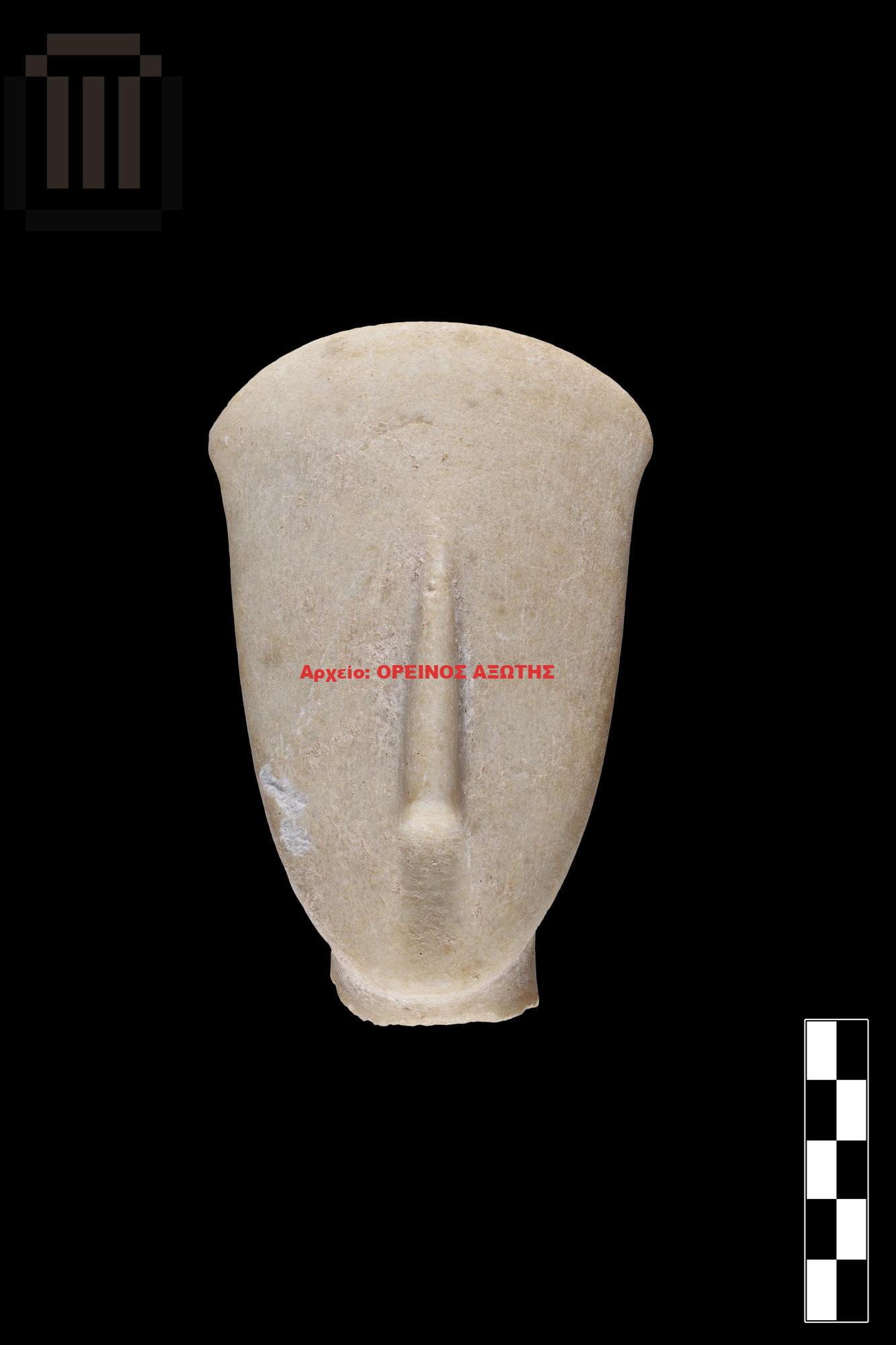 κεφάλι και τμήμα λαιμού μαρμάρινου κυκλαδικού ειδωλίου από Ναξιακό μάρμαρο